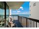Charming balcony featuring comfortable seating and panoramic views of the ocean and sandy beach, offering a tranquil retreat at 2311 S Ocean Blvd. # 771, Myrtle Beach, SC 29577