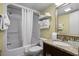 Clean bathroom featuring a shower-tub combo and a granite-topped vanity with provided towels and toiletries at 2311 S Ocean Blvd. # 771, Myrtle Beach, SC 29577