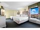 Comfortable bedroom with two beds, complemented by bright natural light from the window creating a relaxing space at 2311 S Ocean Blvd. # 771, Myrtle Beach, SC 29577