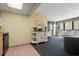 Modern kitchenette combined with living space features contemporary appliances and ample natural light at 2311 S Ocean Blvd. # 771, Myrtle Beach, SC 29577