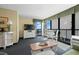 Comfortable living area with TV and a view of the ocean from the balcony at 2311 S Ocean Blvd. # 771, Myrtle Beach, SC 29577