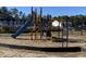 Close up view of the community playground featuring a blue slide in Forestbrook Townhomes in Myrtle Beach, SC at 262 Christiana Ln. # F, Myrtle Beach, SC 29579