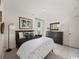 Bright bedroom featuring carpet, a large window, a modern lamp, and neutral decor at 264 Warner Crossing Way, Loris, SC 29569