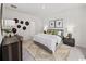 Comfortable bedroom with a serene ambiance, neutral colors, decorative accents, and ample natural light at 264 Warner Crossing Way, Loris, SC 29569