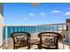 Enjoy stunning ocean views from this private balcony with comfortable seating at 2701 N Ocean Blvd. # 1857/1860, Myrtle Beach, SC 29577