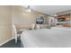 Cozy bedroom space featuring two beds, a dining area, a tv and a small kitchenette at 2701 N Ocean Blvd. # 1857/1860, Myrtle Beach, SC 29577