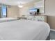 Bedroom with two beds, a dresser and a partial view of the ocean at 2701 N Ocean Blvd. # 1857/1860, Myrtle Beach, SC 29577