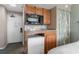 Small kitchenette area includes a microwave and compact refrigerator at 2701 N Ocean Blvd. # 1857/1860, Myrtle Beach, SC 29577