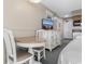 Living space with a dining table and a small kitchenette at 2701 N Ocean Blvd. # 1857/1860, Myrtle Beach, SC 29577