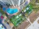 Aerial view of a kidney-shaped pool with turf and lounge seating at 2701 N Ocean Blvd. # 1857/1860, Myrtle Beach, SC 29577