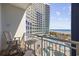 Wide angle balcony showcasing an ocean view, with lounge seating and the hotel at 300 N Ocean Blvd. # 324, North Myrtle Beach, SC 29582