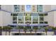 Beautiful entrance to Avista Resort, lined with palm trees and manicured landscaping at 300 N Ocean Blvd. # 324, North Myrtle Beach, SC 29582