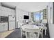 Bright condo living room with an adjacent kitchen and dining area at 300 N Ocean Blvd. # 324, North Myrtle Beach, SC 29582