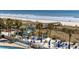 Beachfront area with a bar, pool, and boardwalk to the beach at 300 N Ocean Blvd. # 324, North Myrtle Beach, SC 29582