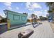 Fun outdoor area with a beach bar, seating, and games at 300 N Ocean Blvd. # 324, North Myrtle Beach, SC 29582