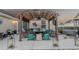 Relaxing backyard featuring a pergola with comfortable seating, a hot tub, and thoughtful landscaping at 304 Carolina Springs Ct., Conway, SC 29527