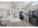 Well-equipped kitchen with stainless steel appliances, granite countertops, and bar seating at 304 Carolina Springs Ct., Conway, SC 29527