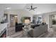 Open-concept living room with stylish furniture and hardwood floors at 304 Carolina Springs Ct., Conway, SC 29527