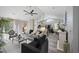 Bright living room with vaulted ceilings, modern decor, and hardwood floors throughout at 304 Carolina Springs Ct., Conway, SC 29527