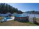 Above-ground pool featuring a fountain for a refreshing backyard experience at 304 Carolina Springs Ct., Conway, SC 29527