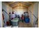 Interior of a backyard storage shed with a wooden structure, filled with household storage items at 304 Carolina Springs Ct., Conway, SC 29527