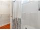 Bright bathroom shower with paisley shower curtain and glass sliding door to closet at 321 Cabo Loop, Myrtle Beach, SC 29588