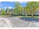 Scenic view of an apartment complex with lush landscaping and convenient parking at 340 Myrtle Greens Dr. # J, Conway, SC 29526