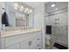 Bright bathroom featuring a double sink vanity, modern fixtures, and a glass-enclosed shower at 351 Lake Arrowhead Rd. # 131, Myrtle Beach, SC 29572