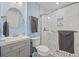 Modern bathroom featuring a stylish vanity with granite top and a glass-enclosed shower at 351 Lake Arrowhead Rd. # 131, Myrtle Beach, SC 29572