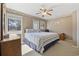 Cozy bedroom with carpet, dresser, and natural light from large windows at 351 Lake Arrowhead Rd. # 131, Myrtle Beach, SC 29572