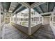 Open air courtyard with multiple levels, white railings, and a small tropical tree at 351 Lake Arrowhead Rd. # 131, Myrtle Beach, SC 29572