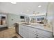 Bright kitchen boasts granite countertops and stainless steel dishwasher at 351 Lake Arrowhead Rd. # 131, Myrtle Beach, SC 29572
