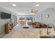 Spacious living room with comfortable seating, ceiling fan, and beautiful natural light at 351 Lake Arrowhead Rd. # 131, Myrtle Beach, SC 29572