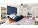 Main bedroom featuring a hardwood floors, a sitting area, and attached bathroom at 356 Boxcar Dr., Longs, SC 29568