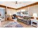 This sun room features wood paneling, an area rug, and lots of windows at 356 Boxcar Dr., Longs, SC 29568