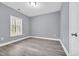 Bedroom with a large window providing natural light and neutral paint at 3837 Mayfield Dr., Conway, SC 29526