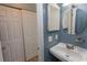Bathroom featuring a vanity with a pedestal sink and additional storage at 4115 Little River Rd. # 4-F, Myrtle Beach, SC 29577