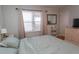 Bedroom featuring natural light from the window and dresser at 4115 Little River Rd. # 4-F, Myrtle Beach, SC 29577