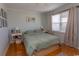 Inviting bedroom with hardwood floors, large window and stylish decor at 4115 Little River Rd. # 4-F, Myrtle Beach, SC 29577