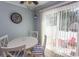 Breakfast nook with a sliding door to the backyard letting in lots of natural light at 4115 Little River Rd. # 4-F, Myrtle Beach, SC 29577