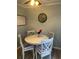 Bright breakfast nook featuring a round table with seating for four at 4115 Little River Rd. # 4-F, Myrtle Beach, SC 29577