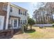 Charming townhome featuring a well-maintained lawn and inviting entrance, offering a blend of comfort and curb appeal at 4115 Little River Rd. # 4-F, Myrtle Beach, SC 29577