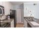 Efficient kitchen featuring white cabinetry and modern appliances, ideal for culinary endeavors at 4115 Little River Rd. # 4-F, Myrtle Beach, SC 29577