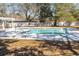 Community pool with a serene setting and ample space to enjoy the weather at 4115 Little River Rd. # 4-F, Myrtle Beach, SC 29577