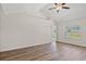A naturally lit open space with vaulted ceilings and wood floors at 423 Lifestyle Court, Surfside Beach, SC 29575