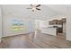 Bright open living space with wood floors and a view of the back yard at 423 Lifestyle Court, Surfside Beach, SC 29575