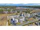 An aerial view of a multi-story condo complex surrounded by a forest, waterfront, and other residential buildings at 4350 Intercoastal Dr. # 2301, Little River, SC 29566