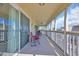 Screened-in balcony with seating provides a tranquil outdoor living space at 4350 Intercoastal Dr. # 2301, Little River, SC 29566