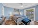 Comfortable bedroom with a queen size bed, balcony access, and stylish decor at 4350 Intercoastal Dr. # 2301, Little River, SC 29566