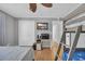 Bright bedroom has a bunk bed, TV, work desk, and roomy closets at 4350 Intercoastal Dr. # 2301, Little River, SC 29566